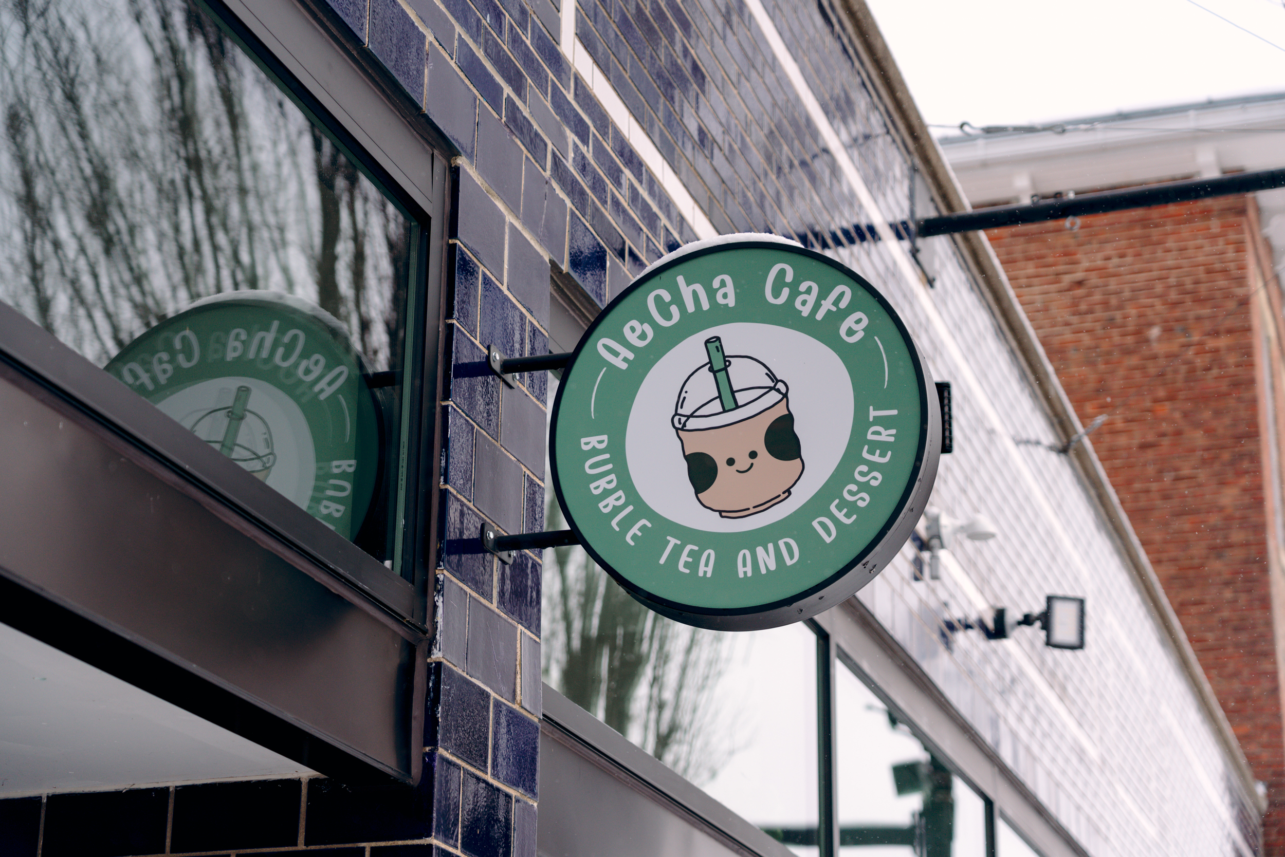 AeCha Cafe in Tipp City Cover Outdoor Sign