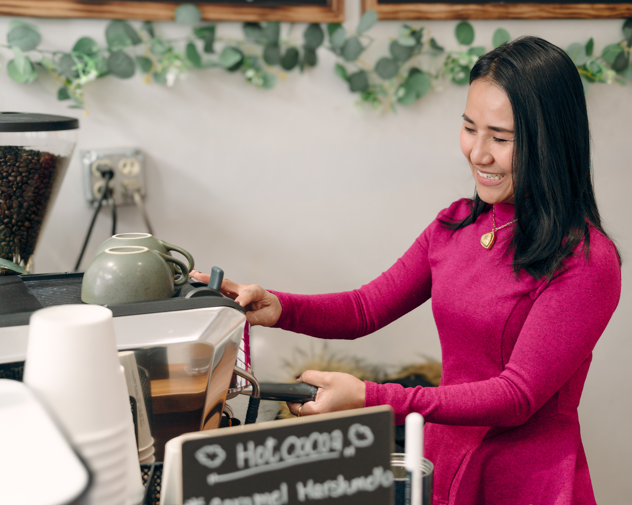 Aoy Atkins of AeCha Cafe Preparing Behind the Counter